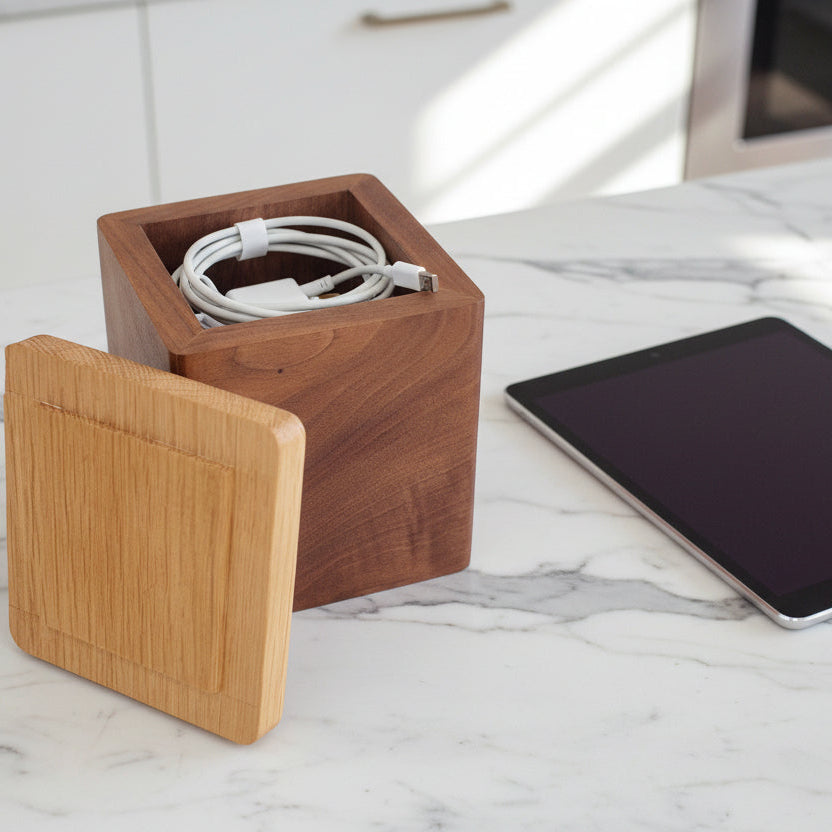 Wooden box with a lid on a white background